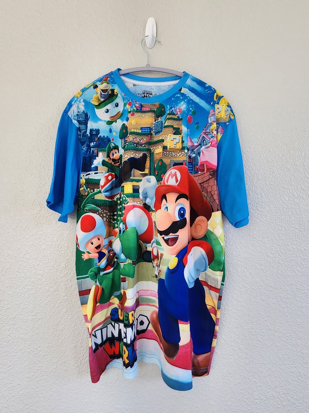 XL Universal Studios Super Nintendo World Grand Opening All-Over Print T-Shirt.